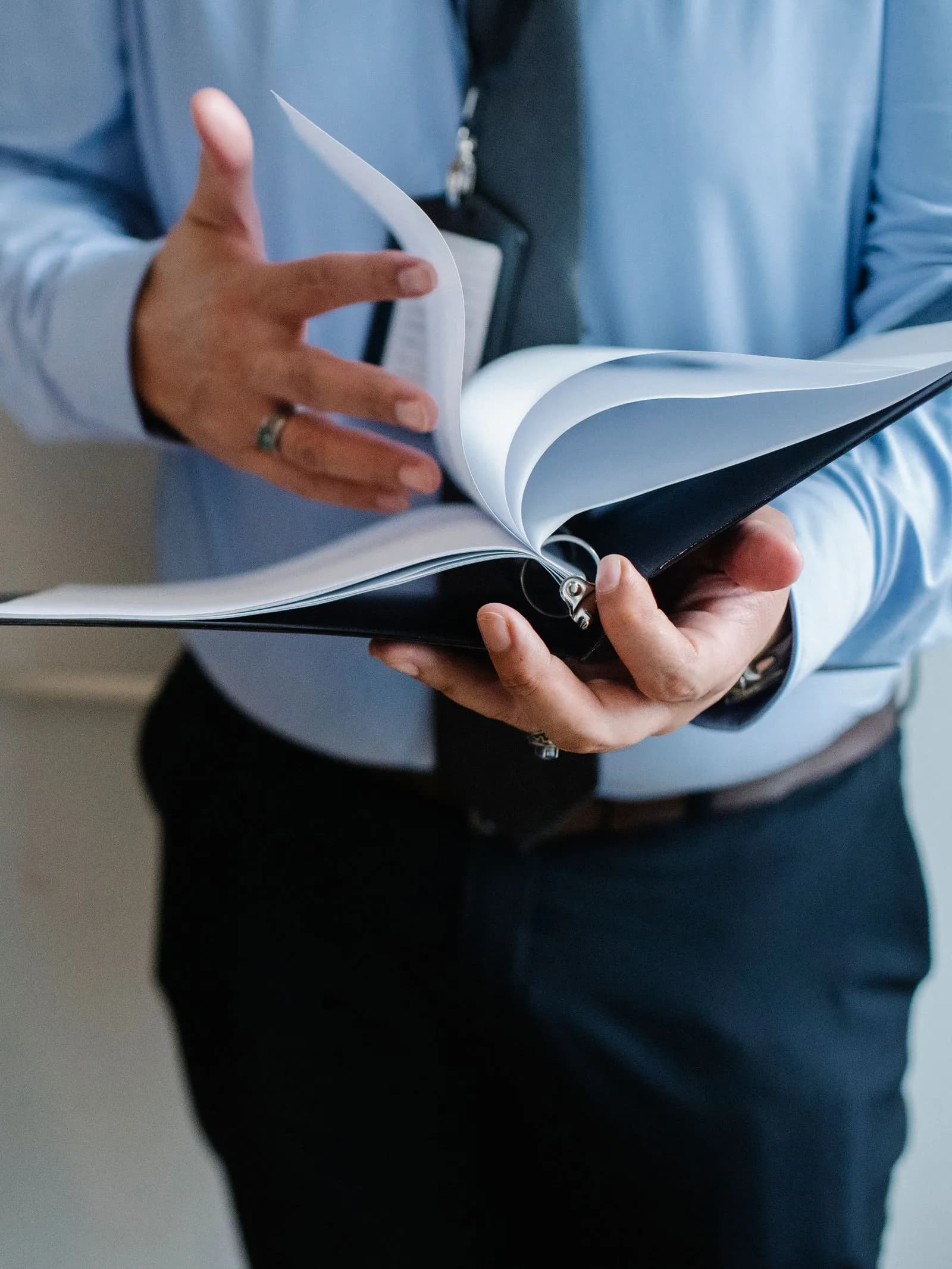 A professional carefully reviewing migration documents